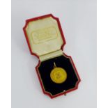 9 carat gold golf medal, inscribed John T Knight, 1920 presented by E. PTC G.C