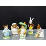 A group of four Beswick Beatrix Potter figures to include 'Benjamin Bunny', 'Hunca Munca