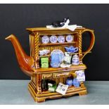 The Rington's Millennium Celebration teapot, modelled as a Welsh dresser, adorned with various '