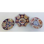 A Chinese octagonal Imari patterned bowl painted with basket of flowers, together with two Imari