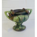 An Austrian Art Nouveau twin handled bowl with fruit and leaf pattern impressed Turn to the base,