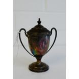 George V silver twin handled urn and cover on circular pedestal foot, bearing hallmark for Sheffield