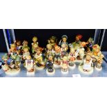 A collection of vintage Hummel figures to include 'Barn Yard Hero', 'Dr', 'Postman', 'Goose