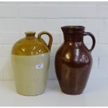 A stoneware two tone crock, together with a salt glazed jug, tallest 35cm, (2)
