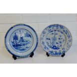 Two 18th century English delft plates, to include one with a pagoda pattern the other with flowers
