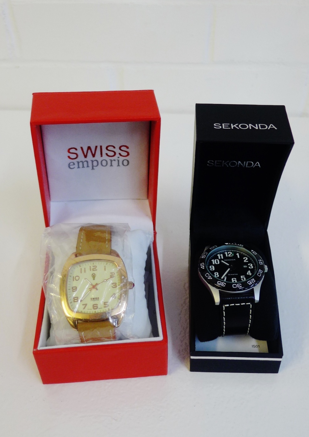 Two Gent's contemporary wristwatches to include Swiss Emporio and Sekonda, both in presentation