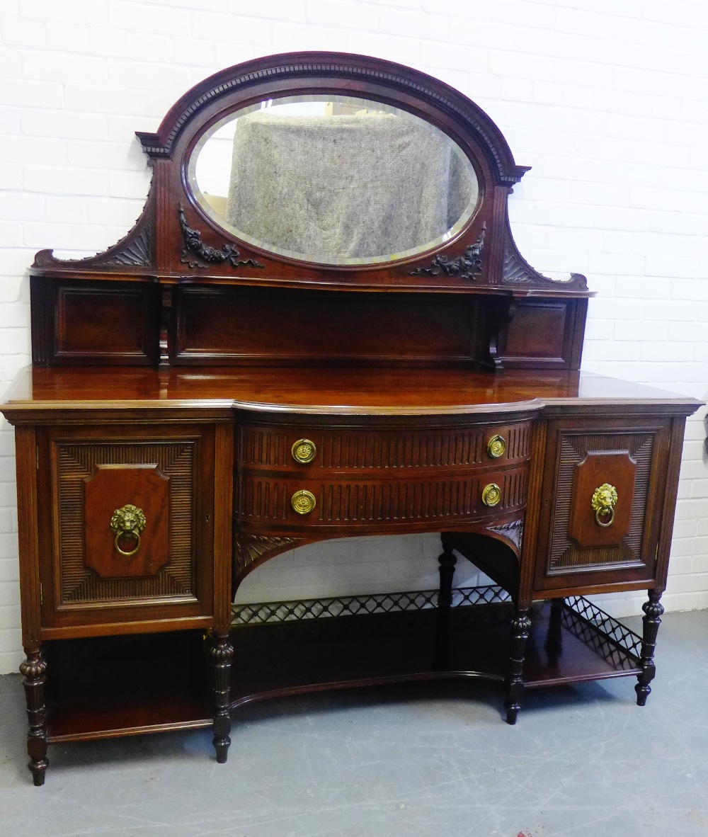 A mahogany mirror back sideboard with two bow front drawers and brass galleried undertier, 188 x