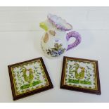 A Portuguese twin glazed Cockerel jug and two pottery plaques, framed, (3)