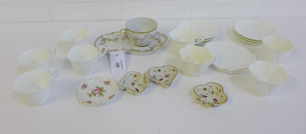 A collection of white glazed porcelains to include Foley china cups and saucers, Limoges trinket