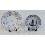 An 18th century continental floral and ribbon patterned dish, a Quimper plate, and a pair of