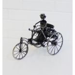 A metal sculpture of a Velocipede and rider, 24cm high