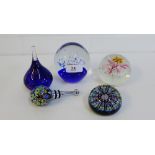 A collection of paperweights, to include a Millefiori paperweight and bottle stopper, (5)