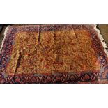 A Persian style rug, the field with birds and tree branch pattern, with floral borders, 300 x 200cm