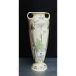 An Arnhem Art Nouveau twin handled vase painted with stylised flowers and foliage with printed