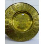 A large brass 'Zarragoza' circular alms dish bearing date 1638, 61cm diameter
