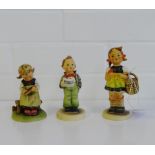 A collection of three Goebel's figures to include 'Soloist', 'Busy Student' and 'Sister', tallest