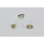 Three 9 carat gold gemset rings to include a diamond and sapphire eternity ring (3)