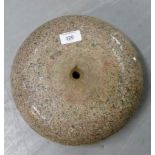 A granite curling stone (handle lacking)