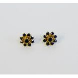 A pair of 9 carat gold sapphire set flowerhead earrings