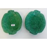 Two green glazed leaf and fruit moulded oblong plates, (2)