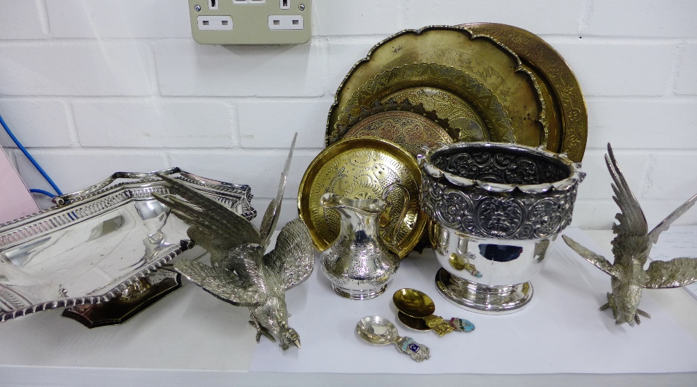 A mixed lot of metal wares to include an Epns twin handled cake basket, jug, planter, brass trays