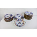 19th century Staffordshire dinner service in Imari colours comprising dinner plates, large bowls,