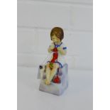 A Royal Worcester porcelain figure 'Saturdays Child works hard for a living', 14cm high