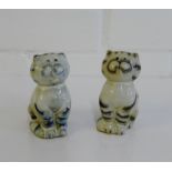 A pair of pottery cat cruets (2)