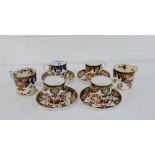 A set of four Royal Crown Derby Imari patterned cups and saucers, together with two Bloor Derby