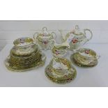 An English porcelain Rockingham style tea set, comprising teapot, twin handled sugar bowl, milk jug,