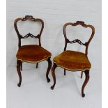 Pair of mahogany framed chairs with carved top rail and bar backs, with upholstered seats and