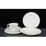 A quantity of Minton 'White Fire' glazed china table wares to include cups, saucers, bowls and