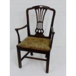 A mahogany framed open armchair with pierced splat back and floral upholstered seat