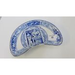 A Wedgwood blue and white kidney shaped dish, 'Pastry, enough means hell more - disease', 24cm wide