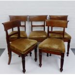 Set of five mahogany blade back chairs, each with carved spar back and upholstered seats, on