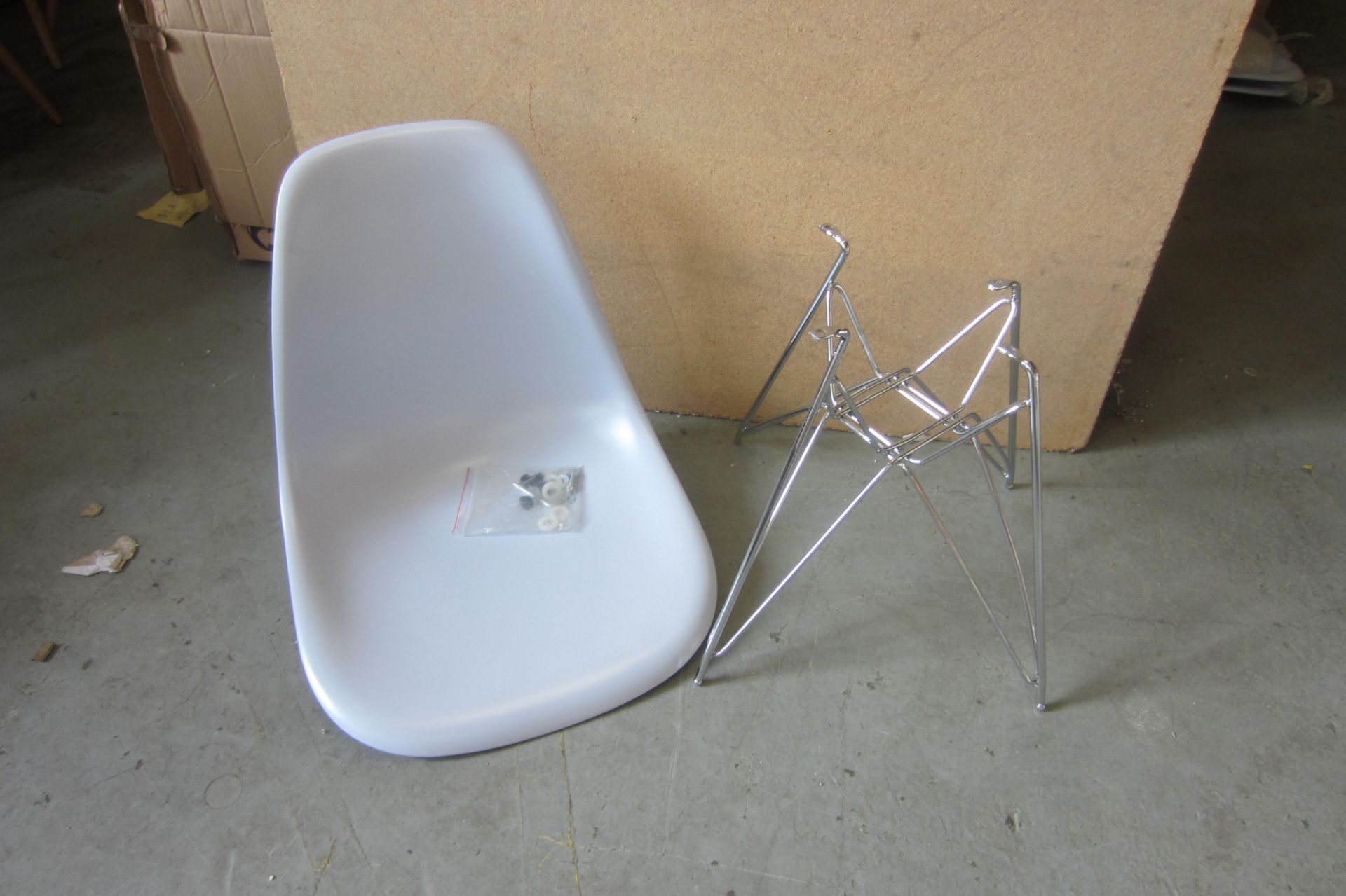 As New/Unassembled: Pale Blue/Grey DSW Chair in Charles Eames Style with Wire Metal Base.