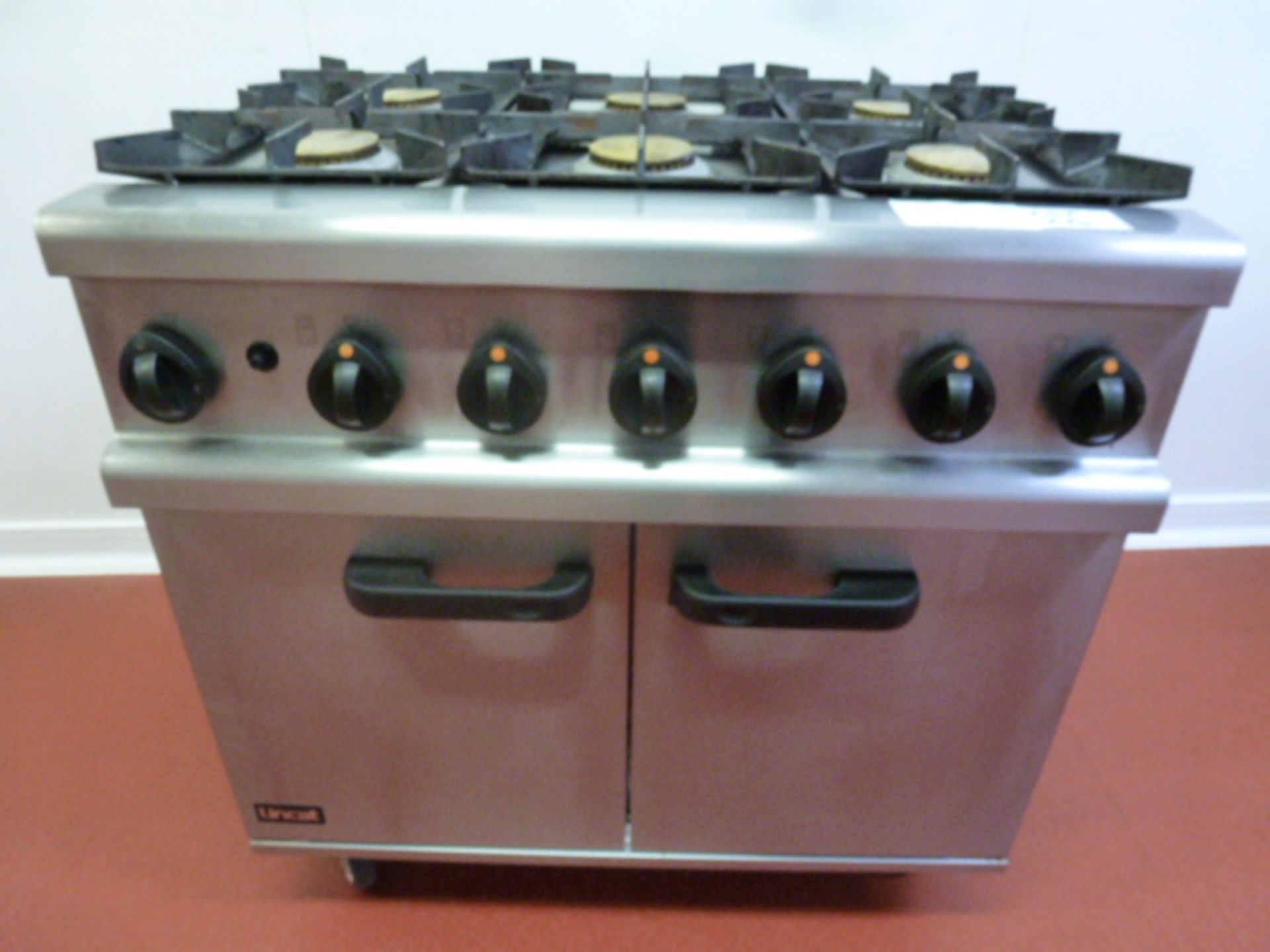 Lincat Stainless Steel 6 Ring Gas Range Cooker on Castors with Oven Under. Model OG7002/N, S/N