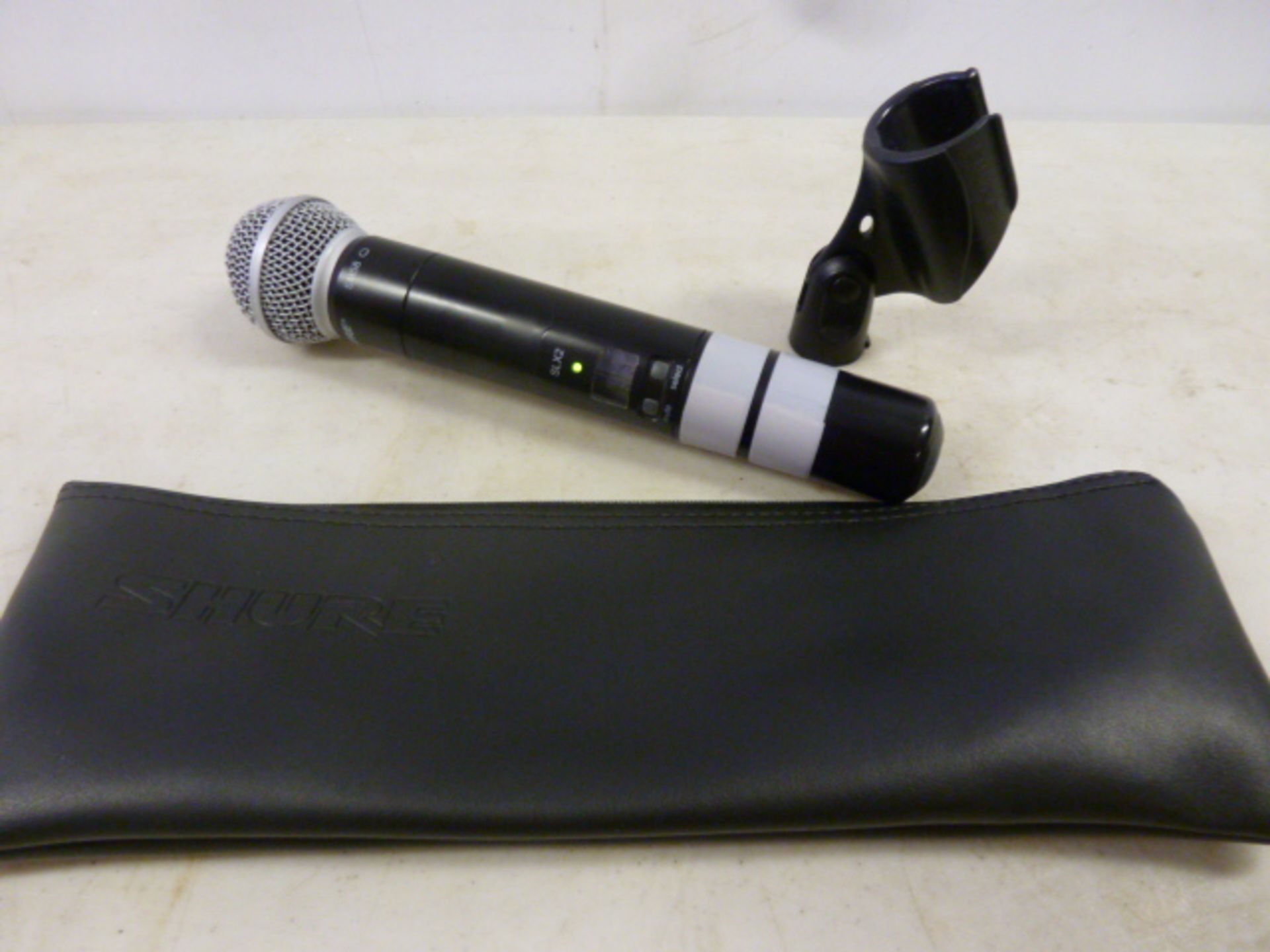 Shure SM58 Wireless Microphone In Black, Model SLX2. Comes with Black Pouch & Microphone Stand