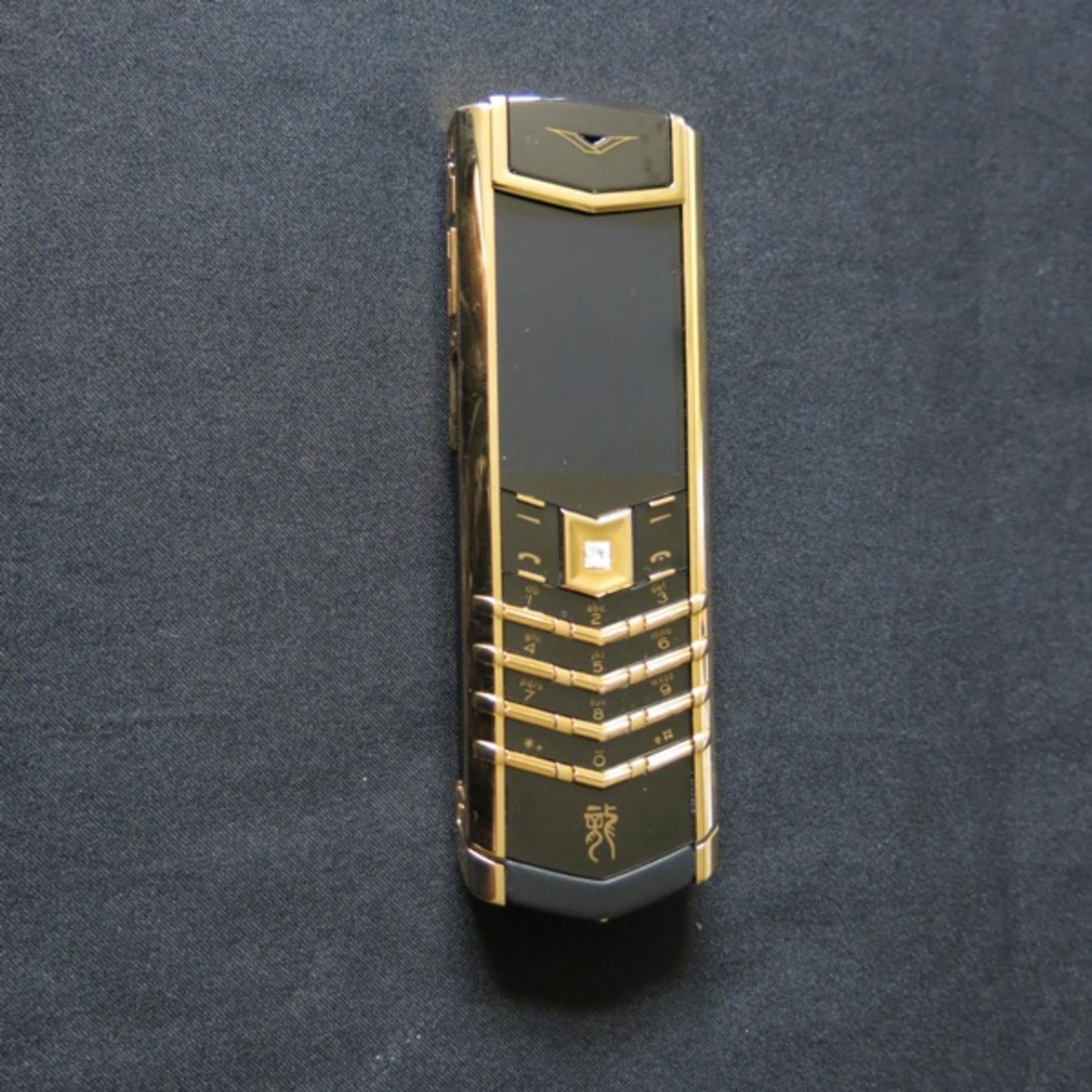 Vertu 18kt Yellow Gold Signature S Phone. Special Edition Dragon with Small Diamond Eyes &
