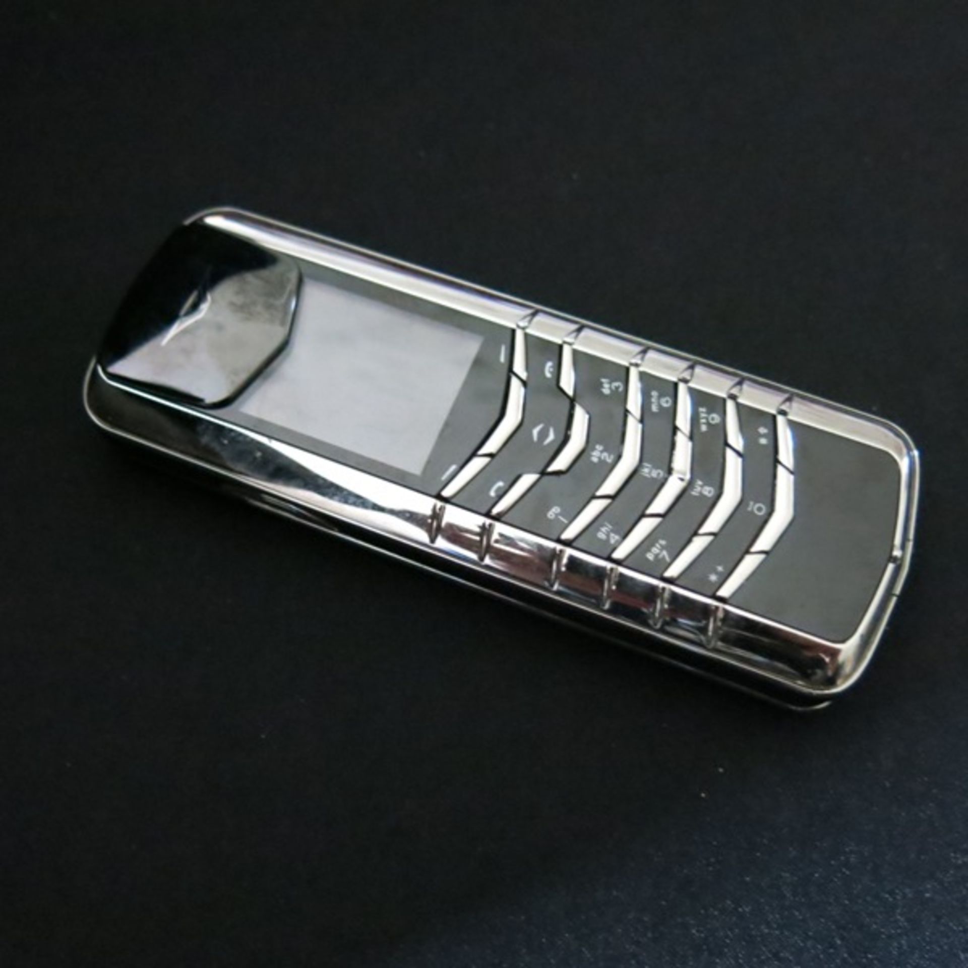 Vertu Signature Classic Phone in Platinum (950) with Platinum Functional Keys & Outer Cover.