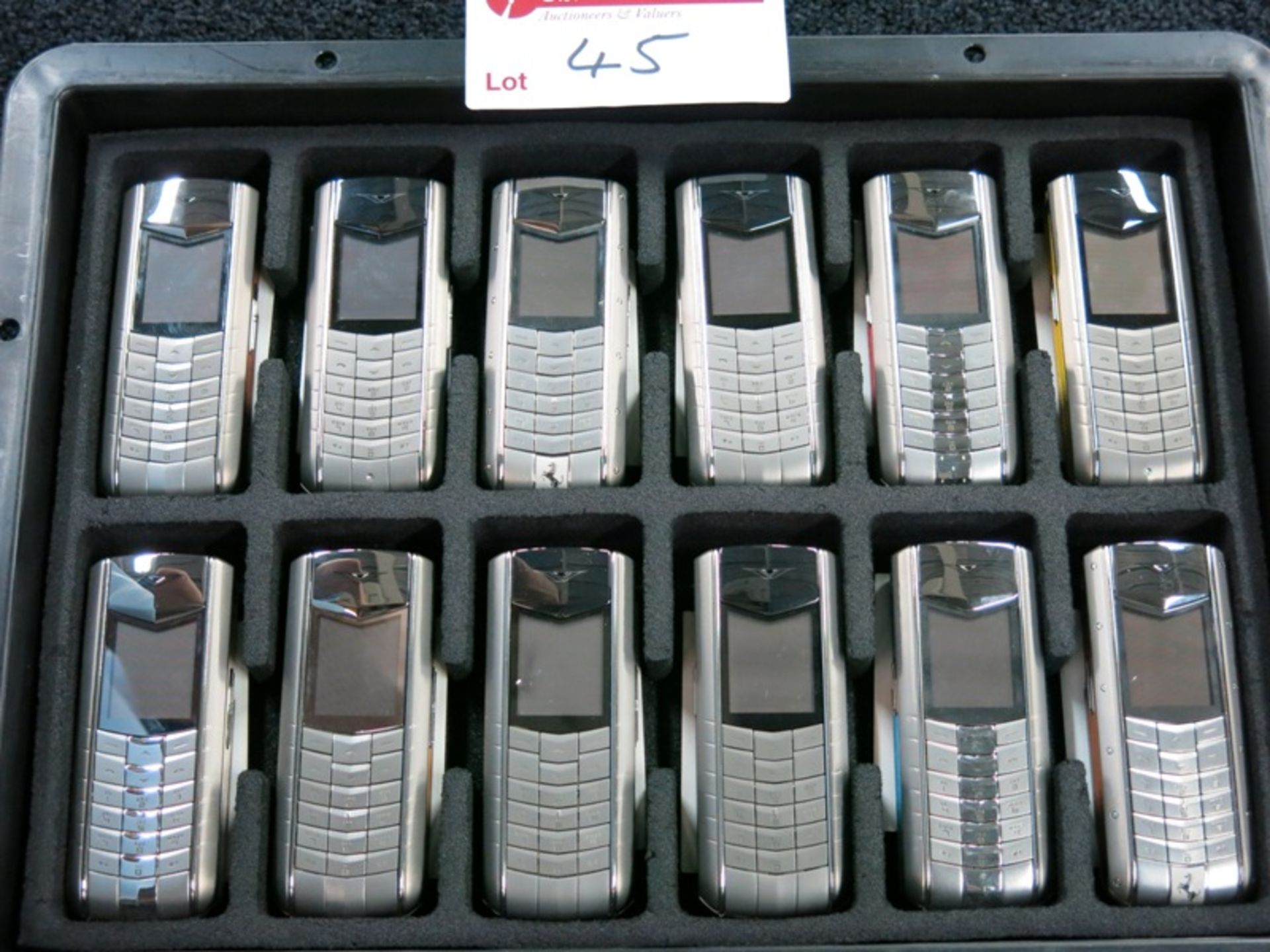 Archive Collection of 54 Vertu Ascent phones made of Titanium, Stainless Steel, Ceramic Pillow,