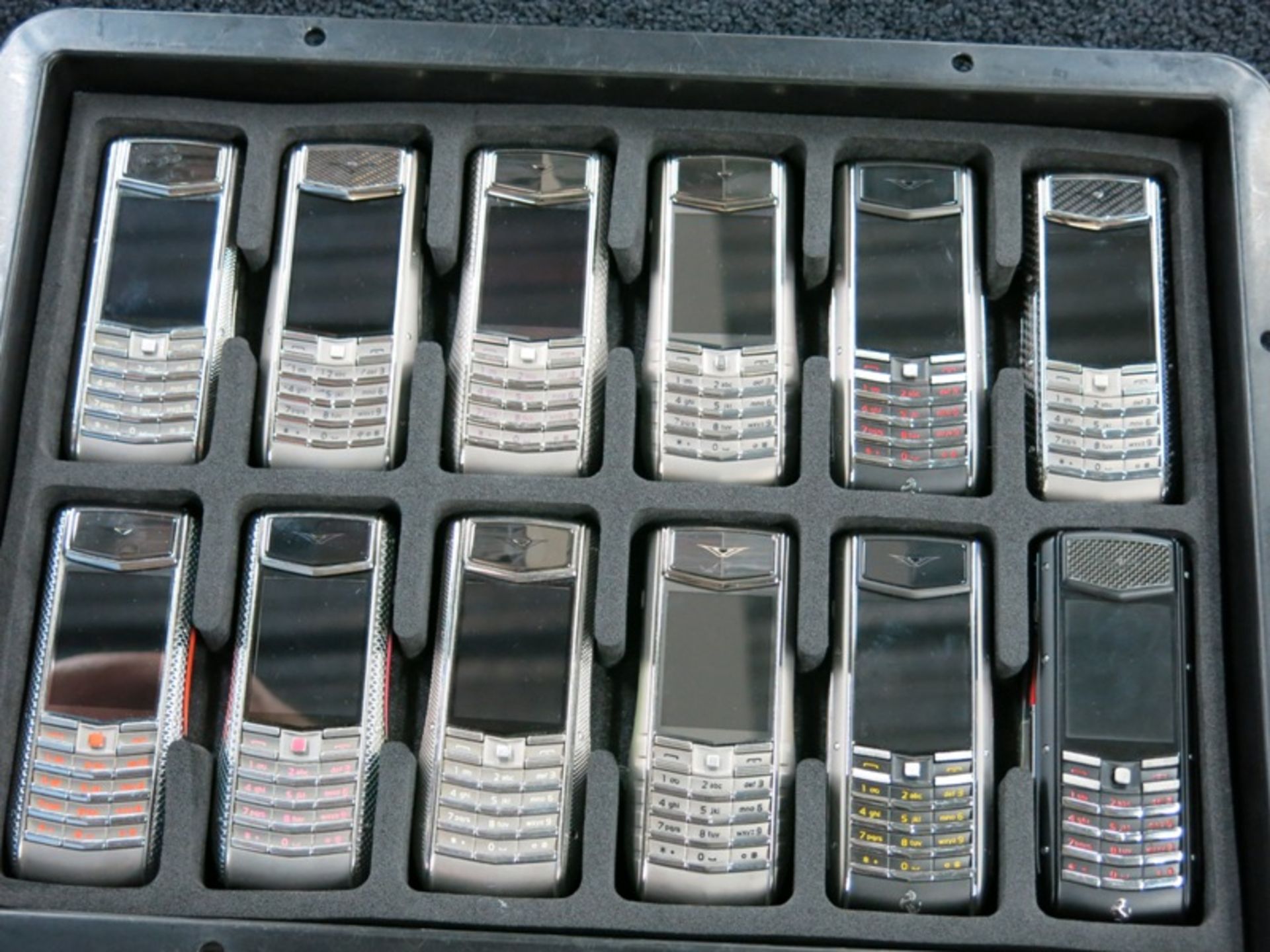 Archive Collection of 46 Vertu Ascent Ti Phones made of Titanium, Stainless Steel, Ceramic Pillow, - Image 2 of 4