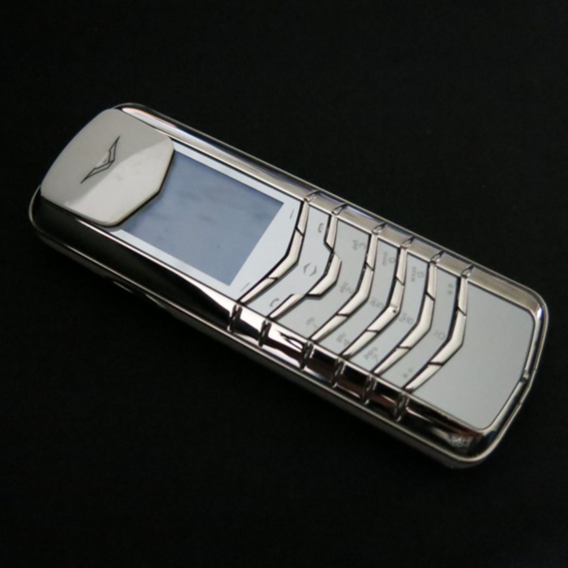 Vertu Signature Classic Phone in Platinum (950) with Platinum Functional Keys & Outer Cover.