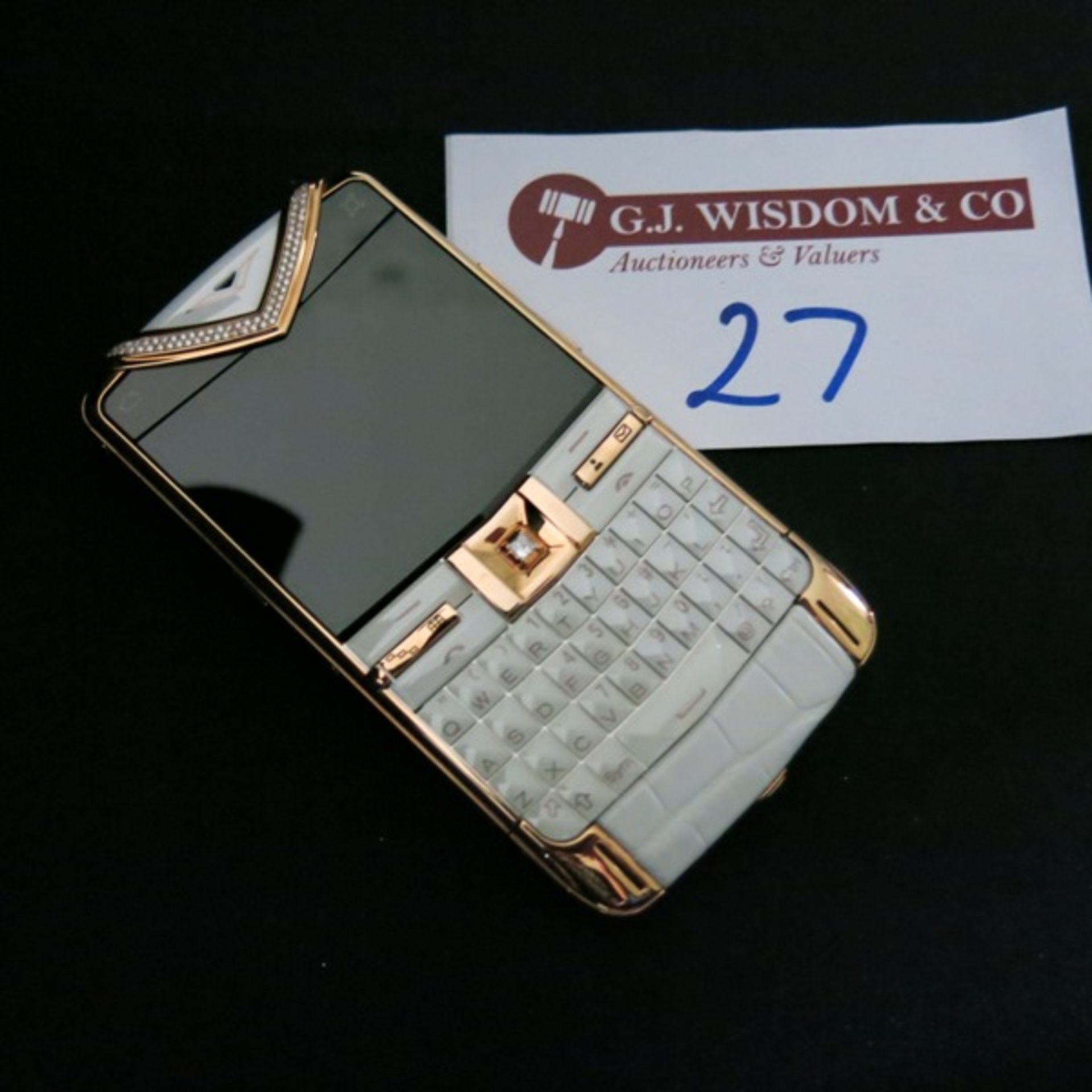 Vertu Constellation Quest Phone in 18kt Red Gold with Diamond Pillow Trim & Diamond Select Key.