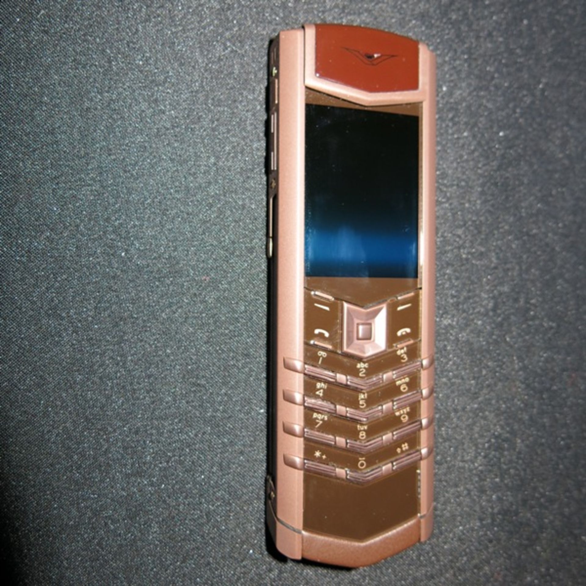 Vertu Pure Chocolate Stainless Steel Phone with 18kt Red Gold Backplate. Furnished with Brown - Image 5 of 5