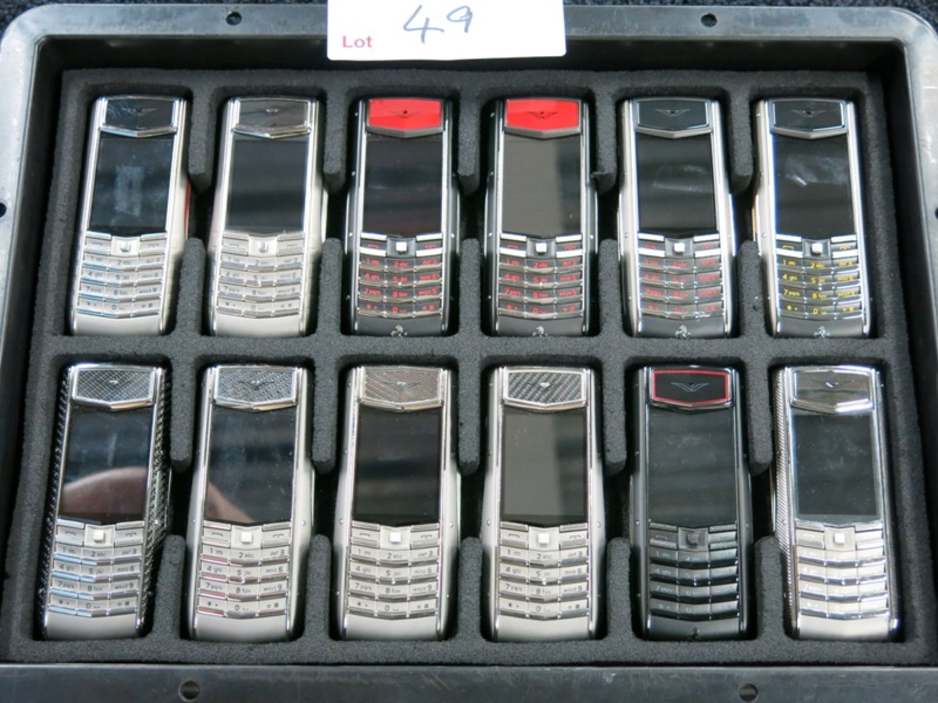 Archive Collection of 46 Vertu Ascent Ti Phones made of Titanium, Stainless Steel, Ceramic Pillow,