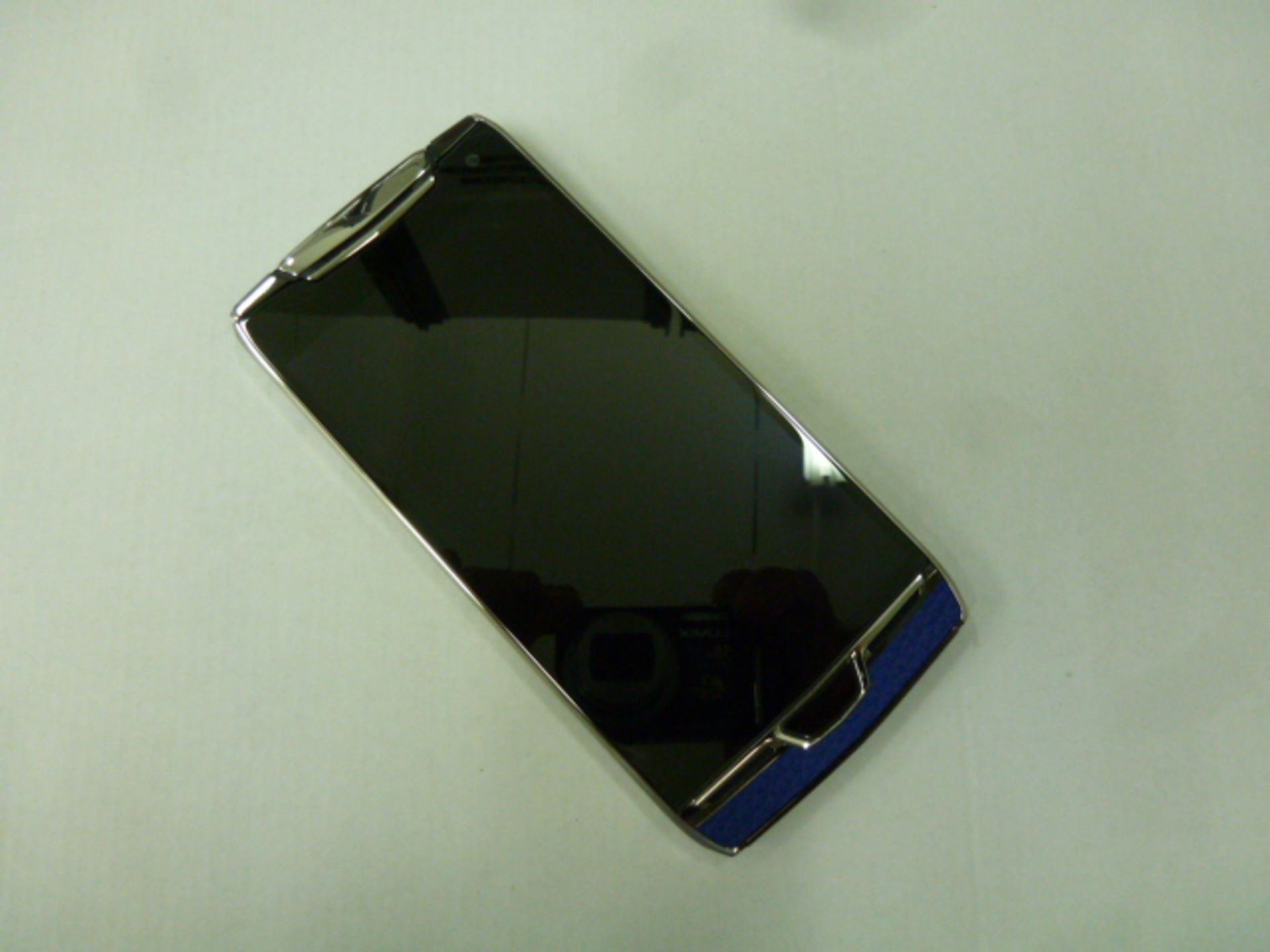 Vertu Tron Touch Phone, Blue Leather back. Unused Demonstrator, s/n 8-001222. Comes in Sales Box