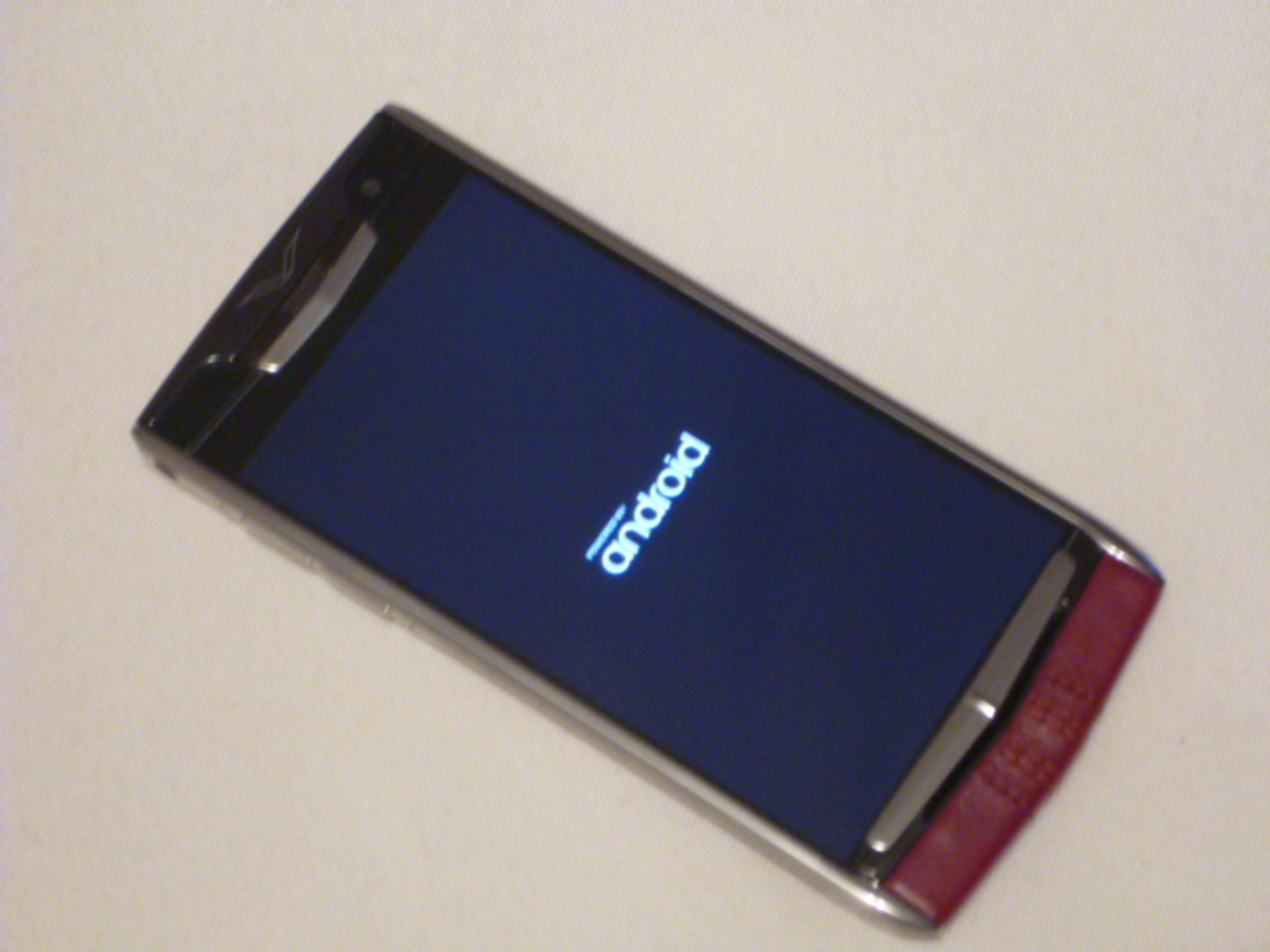 Vertu Signature Touch Phone with Garnet Leather, S/N 3-020723. Comes with Sales Pack & Charging