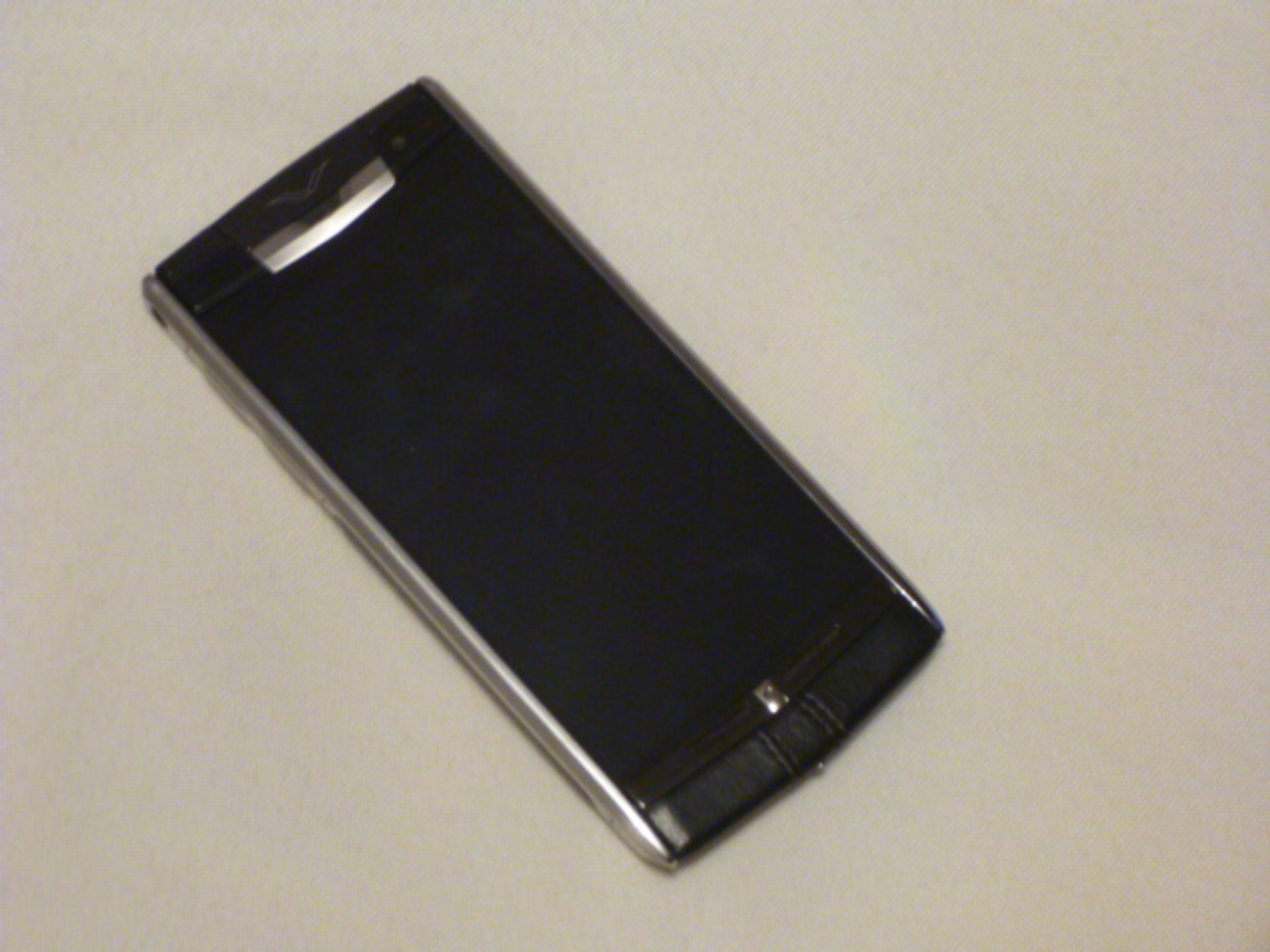 Vertu Signature Touch, Black Stitched Leather, Used Demonstrator. S/N E-001277. Comes with Charger &