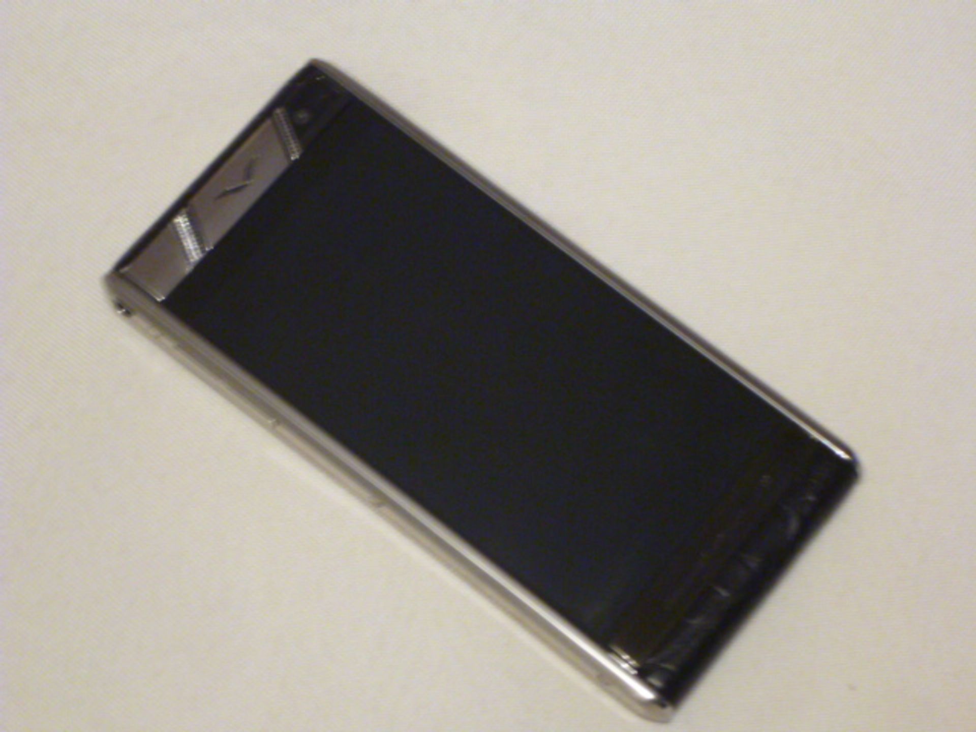 Vertu Aster Touch Phone, Black Alligator with Clear & Black Diamond Inserts. S/N IT-002671. Comes